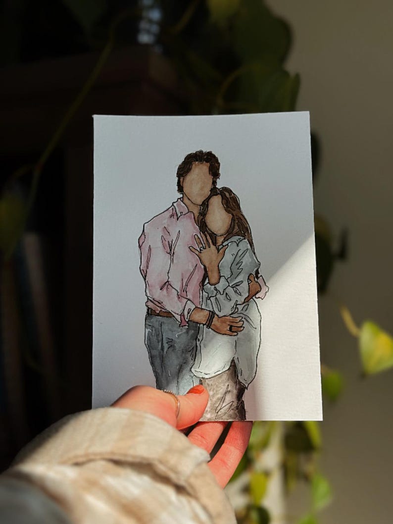 May include: A watercolor painting of a couple embracing. The man is wearing a pink button-down shirt and the woman is wearing a light blue shirt. They are both smiling.