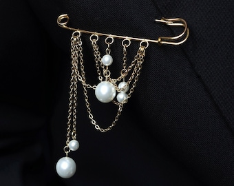 Safety pin brooch with small chains and pearls