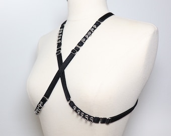 Multi-position elastic mini harness with eyelets and piercings