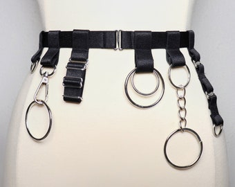 Satin elastic belt with multiple silver O rings