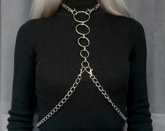 Silver color chain harness and multiple rings