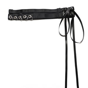 Two-row garter with lacing and piercings