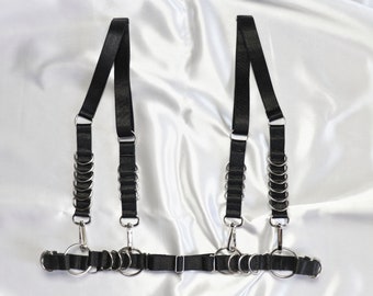Satin underbust harness decorated with D rings, O rings and big carabiners.