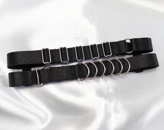 Elastic garter with two rows decorated with D rings and rings