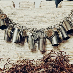 Bullet Lovers Bracelet has a mixture of 40mm nickel casings, 45mm, 38spl & 20 gauge Shotgun Shells.