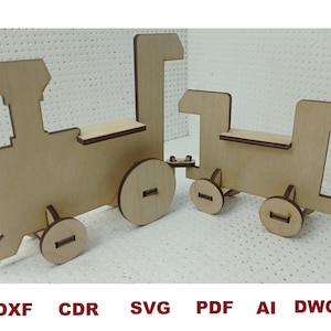 May include: A wooden toy train with a locomotive and a boxcar. The train is made of unfinished wood and has a simple design. The locomotive has a chimney and a bell. The boxcar has a door on the side.