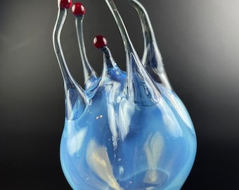 Hand Blown Glass Alien Flower Sculpture in Blue and Red | Borosilicate in Concrete