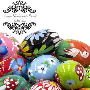 Colorful wooden Easter eggs. The eggs are made out of wood and hand painted. Floral eggs and eggs with stork, mushroom.