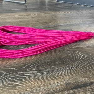 Pink synthetic dreadlocks double ended or single ended extensions