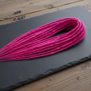 Pink synthetic dreadlocks