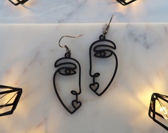 Face earrings h&m best sale