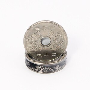 This our antiqued version of the ring with a real circulated 50 yen coin.