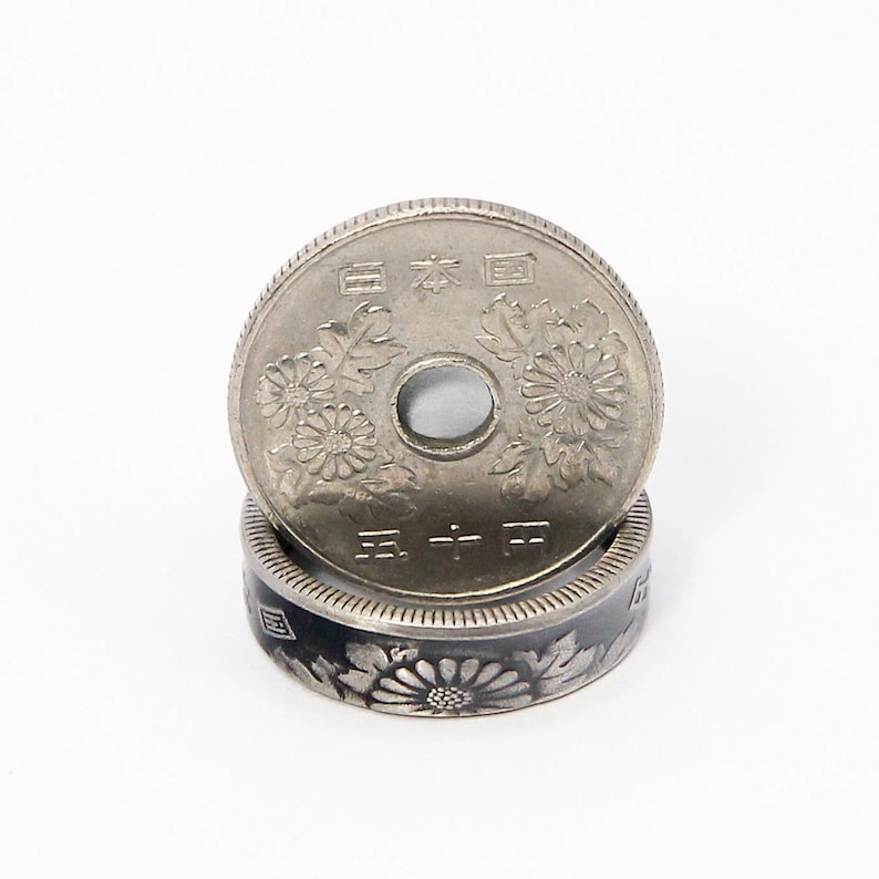 This our antiqued version of the ring with a real circulated 50 yen coin.