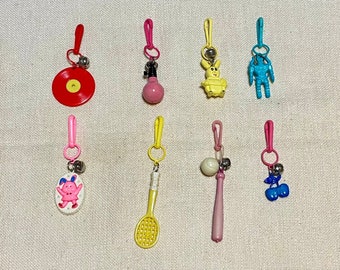 Vintage 80’s Retro Plastic Charms Vinyl Record, Light Bulb, Yellow Bunny, Pink Bunny, Tennis Racket, Bat & Ball, Cherries, Transformer Charm