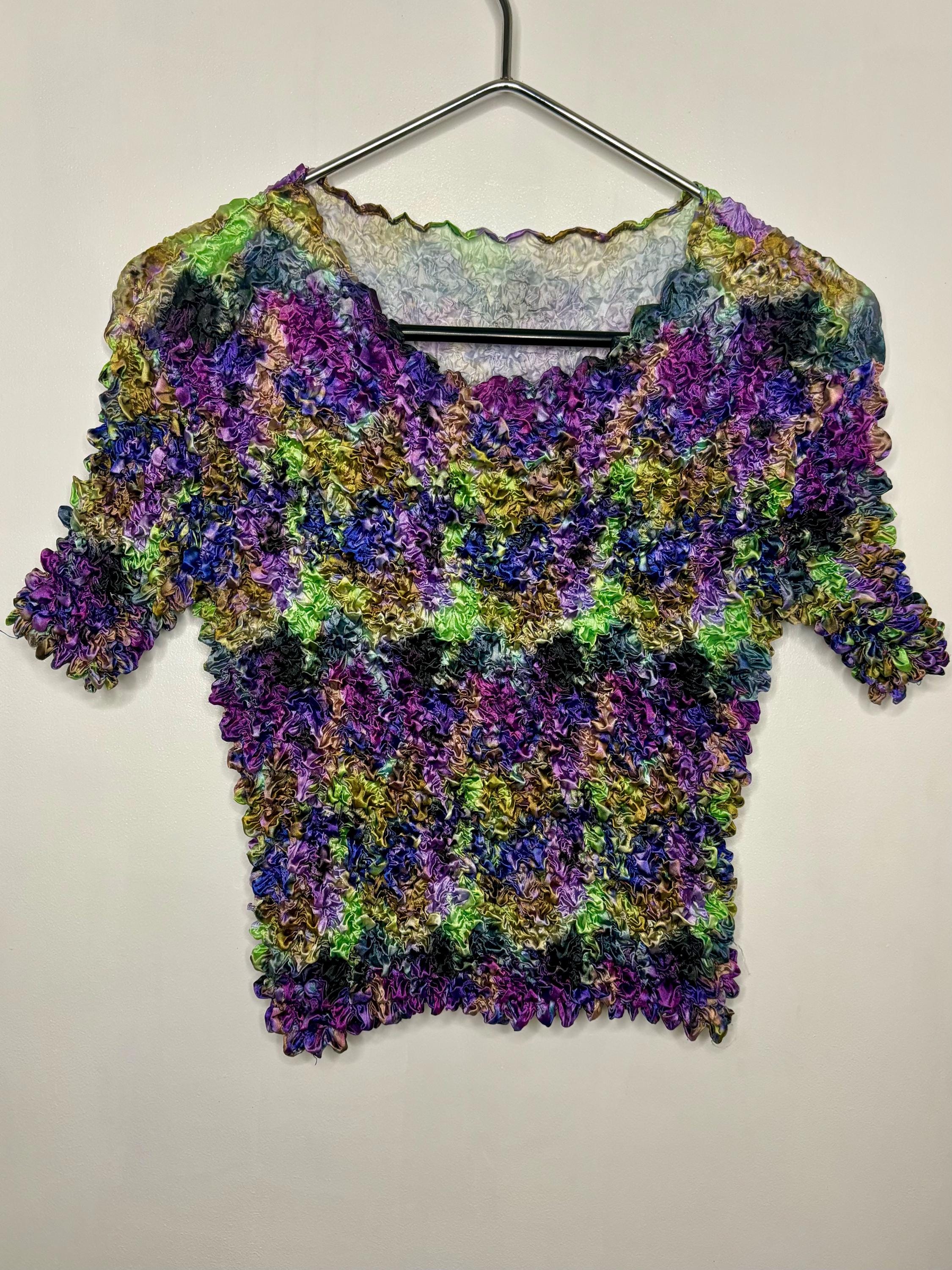 プリーツプリーズ　カラフル抽象模様 ノースリーブチュニック プリーツプリーズカラフル抽象模様 ノースリーブチュニック