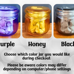 May include: Three glass jars with lids, each filled with small folded paper stars. The jars are available in purple, honey yellow, and black. Text on the image reads: Purple, Honey, Black, Choose which color jar you would like during checkout.