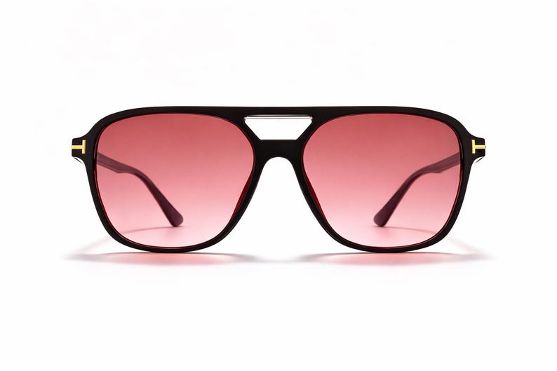 May include: A white ceramic mug with a black handle and the text "But First, Coffee" in a bold, black font. The mug is filled with a dark liquid, likely coffee, and sits on a light-colored surface.