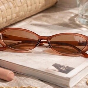 Nine & Co Womens Sunglasses Brown Striped Oval Frame Gradient Lens 22614 Nine West Oval Sunglasses for Women for sale | eBay main image 3