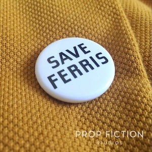 May include: White button with black text that reads "Save Ferris".