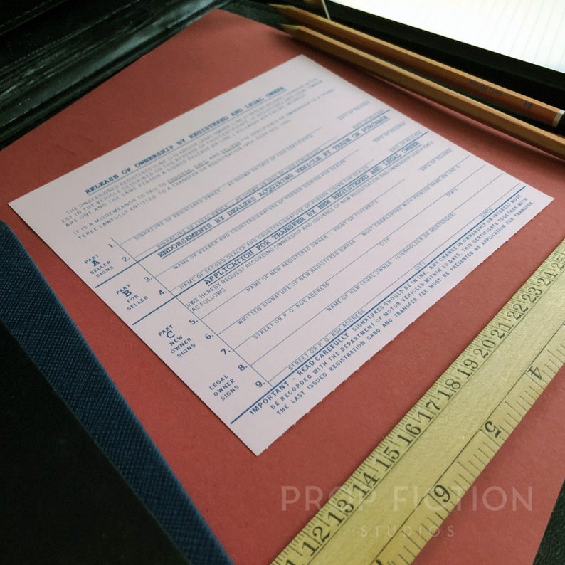 May include: A pink and white form titled "Release of Ownership by Registered and Legal Owner" with sections for the seller and new owner to sign. The form includes spaces for the name of the seller, the name of the new owner, the vehicle identification number, the date of sale, and the signature of the seller and new owner.