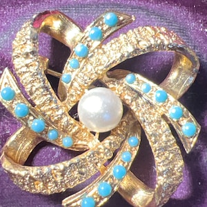 Metal turquoise and seed pearl brooch
