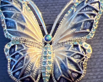 Metal and enamel butterfly brooch