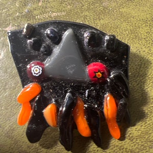 Unusual pottery brooch