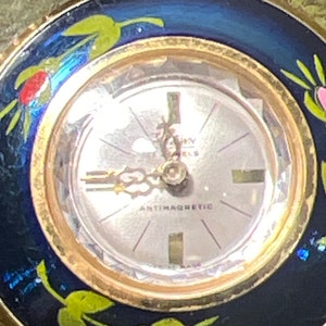 A Striking watch pendant