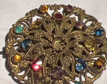 Metal and glass Czech brooch