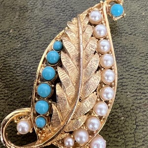 metal turquoise and seed pearl leaf