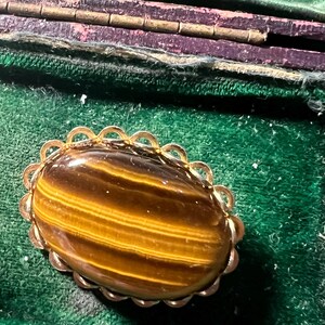 lindo broche de ojo de tigre
