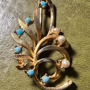 metal seed pearl and turquoise brooch