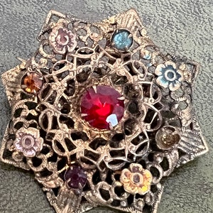 stunning metal and glass Czech brooch