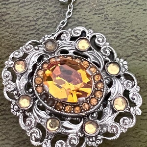 stunning metal and glass Czech brooch