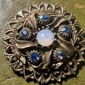 gold metal and glass Czech brooch
