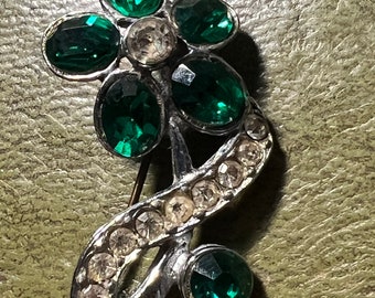 metal and glass brooch