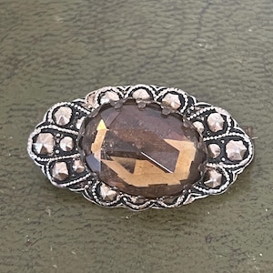 small glass and metal Czech brooch