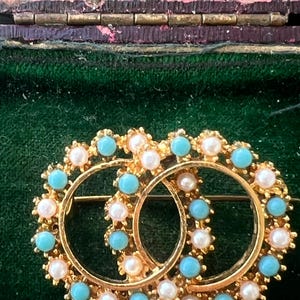 metal turquoise and seed pearl brooch