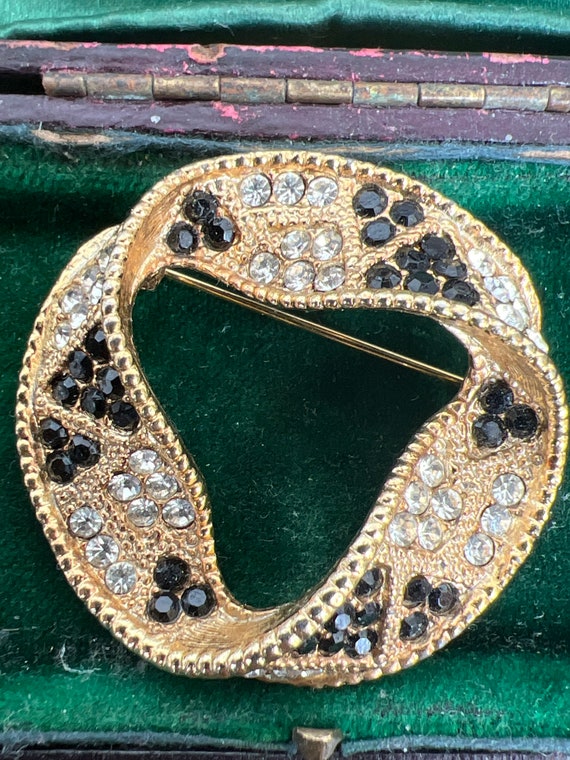 Pretty metal and paste brooch 1960