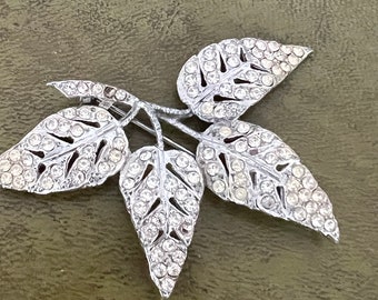 metal and diamanté brooch