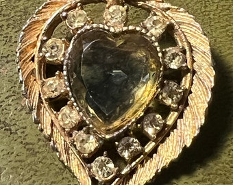 metal and citrine glass brooch