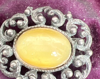 Metal and agate brooch