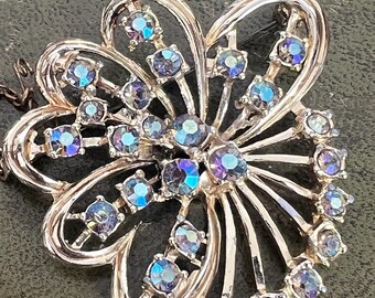 stunning metal and glass broich