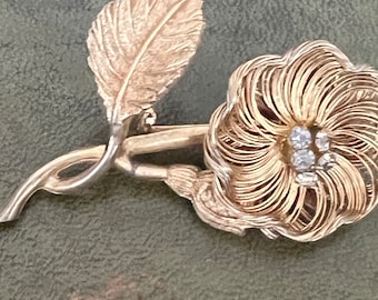 gold metal paste rose brooch