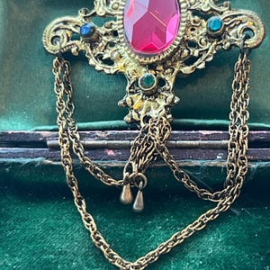 stunning metal and glass Czech dangle brooch