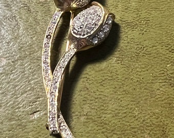 metal and paste rose brooch