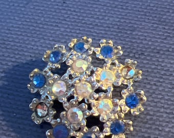 Metal and glass brooch