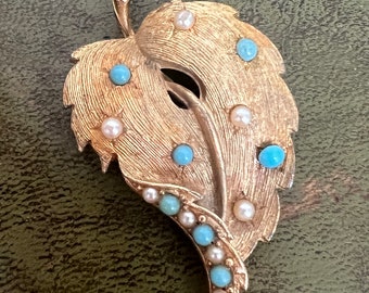 gold metal turquoise and pearl brooch