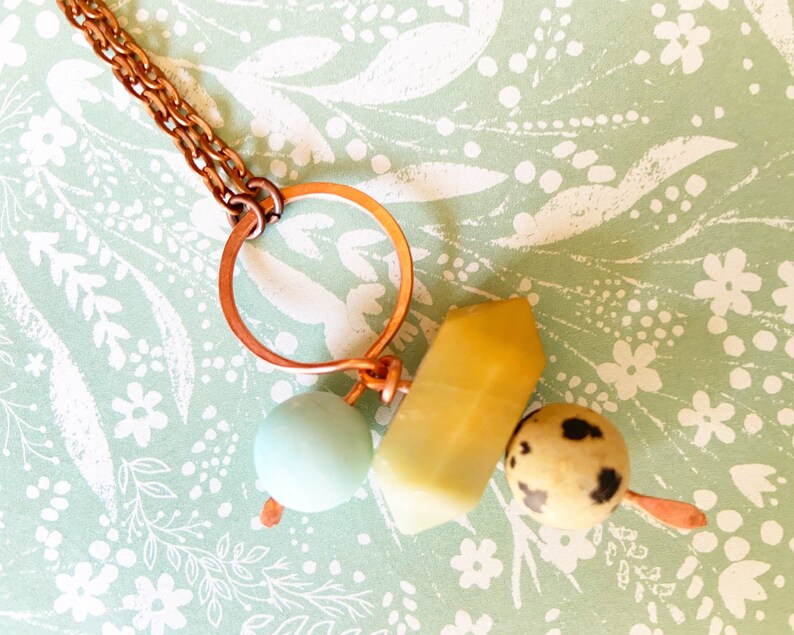 Copper metal work necklace with sky blue mountain jade and Dalmatian Jasper amazonite