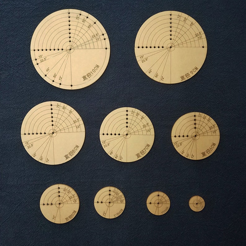 May include: A set of eight circular wooden rulers with different diameters, ranging from 5 cm to 10 cm. Each ruler has a circle marked with degree markings and a center point. The rulers are labeled with their diameter in centimeters.